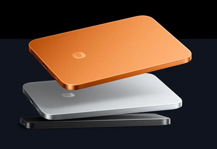 xiaomi-ultrathin-magnetic-power-bank-5000-15w-orange-portatuli-damteni-photo-2