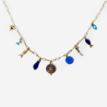 Product image of ტიტანის მოოქროვილი ყელსაბამი ჩარმებით