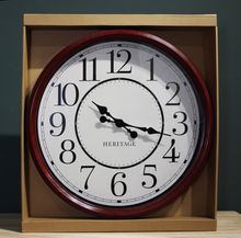 Product image of 48.5 სმ-იანი შავი რკალით კედლის საათი