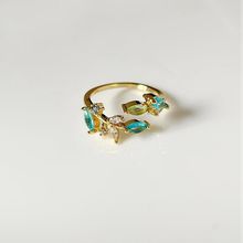 Product image of ოქროსფერი ბეჭედი მწვანე თვლებით