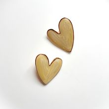 Product image of კრემისფერი გულის საყურე