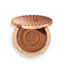 Product image of Charlotte Tilbury BEAUTIFUL SKIN SUN-KISSED GLOW BRONZER 2 medium ბრონზერი