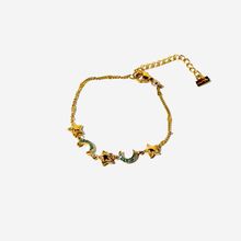 Product image of ტიტანის მოოქროვილი სამაჯური მთვარე და ვარსკლავები