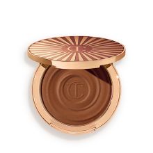 Product image of Charlotte Tilbury BEAUTIFUL SKIN SUN-KISSED GLOW BRONZER 3 tan
