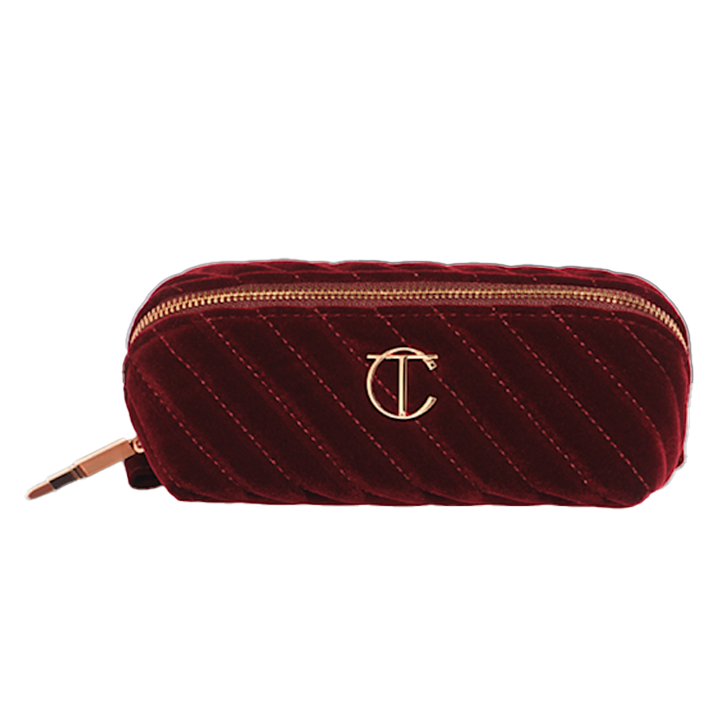 charlotte-tilbury-makeup-bag-of-dreams-mini-kosmetikis-chanta
