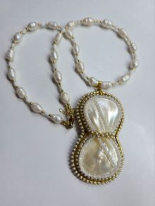 Product image of matasi მარგალიტის ყელსაბამი,სადაფის და მთვარისქვისგან დამზადებული კულონით.(ხელნაკეთი)