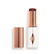Product image of Charlotte Tilbury UNREAL SKIN SHEER GLOW TINT HYDRATING FOUNDATION STICK 16 Deep ტონალური კრემი