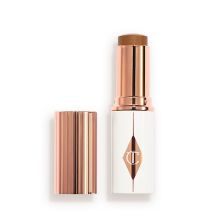 Product image of Charlotte Tilbury UNREAL SKIN SHEER GLOW TINT HYDRATING FOUNDATION STICK 13 Deep ტონალური კრემი