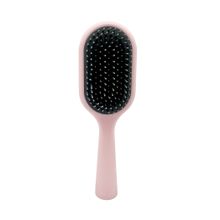 Product image of Mini Detangling Brush with Cleaning Tool სავარცხელი