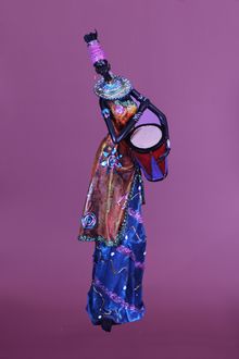 Product image of 54 სმ-იანი აფრო ქალი დაფდაფით