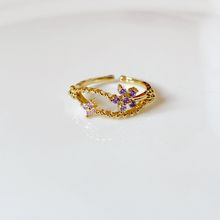 Product image of ოქროსფერი თვლიანი ბეჭედი ვარდისფერი ყვავილით