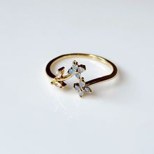 Product image of ოქროსფერი თვლიანი ბეჭედი ორი ცისფერი ყვავილით