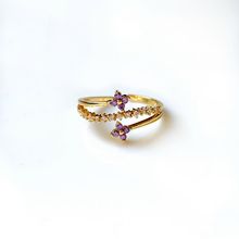 Product image of ოქროსფერი თვლიანი ბეჭედი ორი იასამნისფერი ყვავილით და თვლებიანი ზოლით